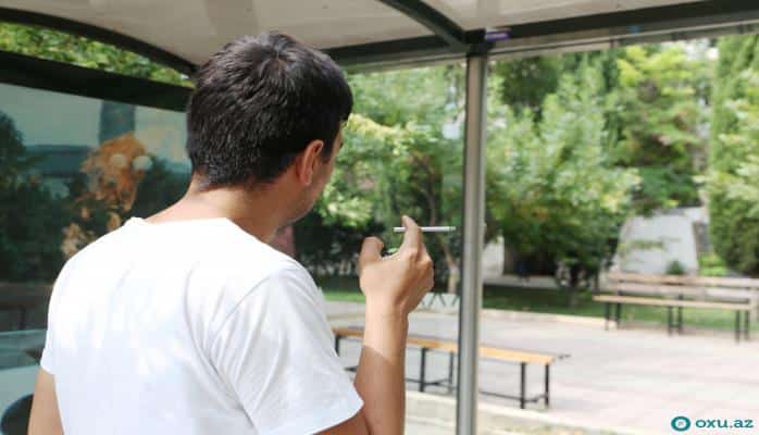 İctimai yerlərdə siqaret çəkənlər niyə cərimələnmir? - Şərh